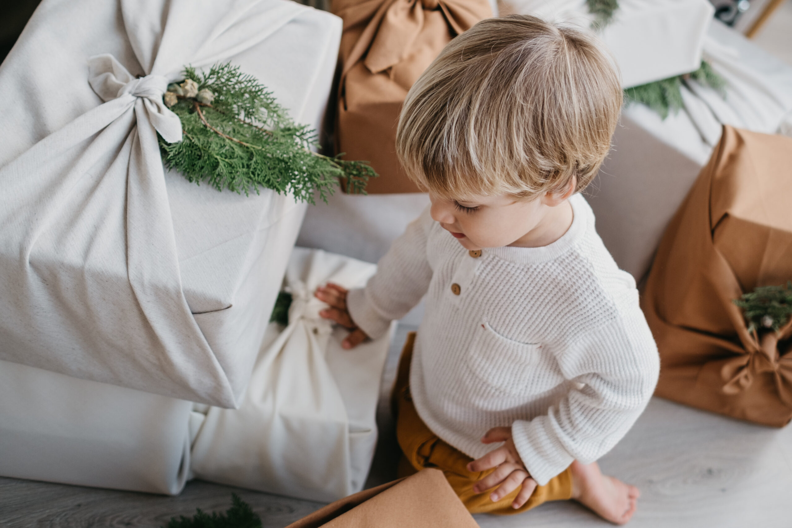 gift wrapping hacks boy with furoshiki cloth wrapping