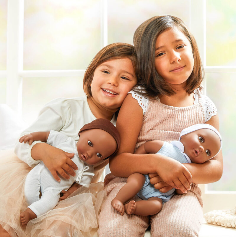 girls with Lullababy twin dolls