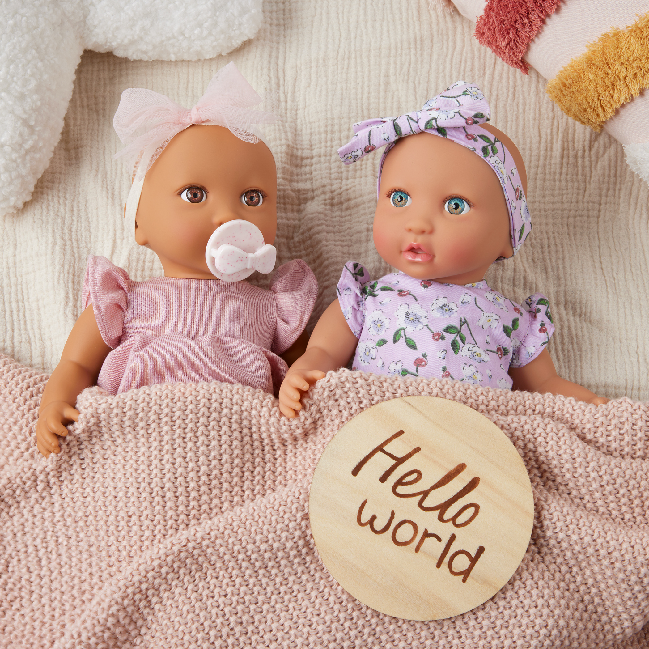 LullaBaby pink and floral dolls