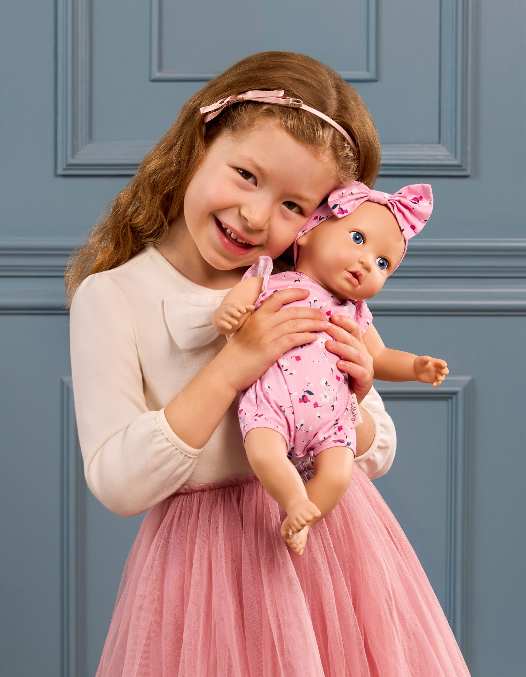 girl and lullababy doll big feelings toddler tantrums